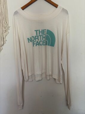 The North Face Women's Cream crop top Long-Sleeve Tee with Teal Logo